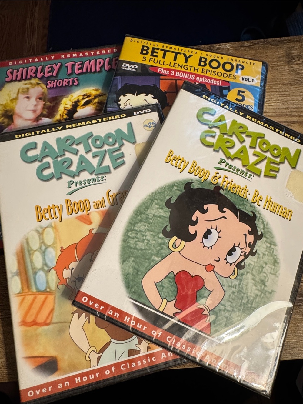 Shirley Temple And 3 Unopened Betty Boop DVDs.